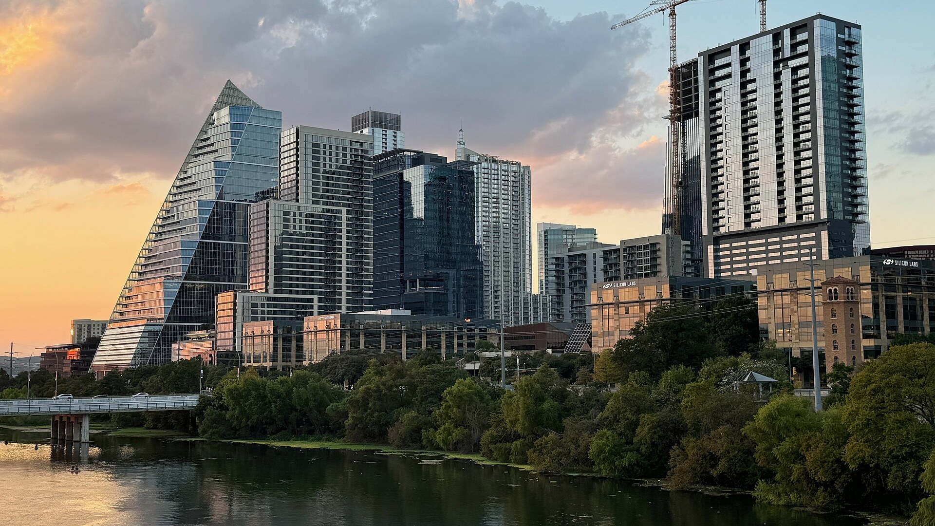 AI-enhanced Downtown Austin skyline with high-rise condo towers and city streets